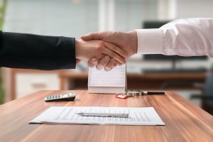 Businessman and lawyer shaking hands