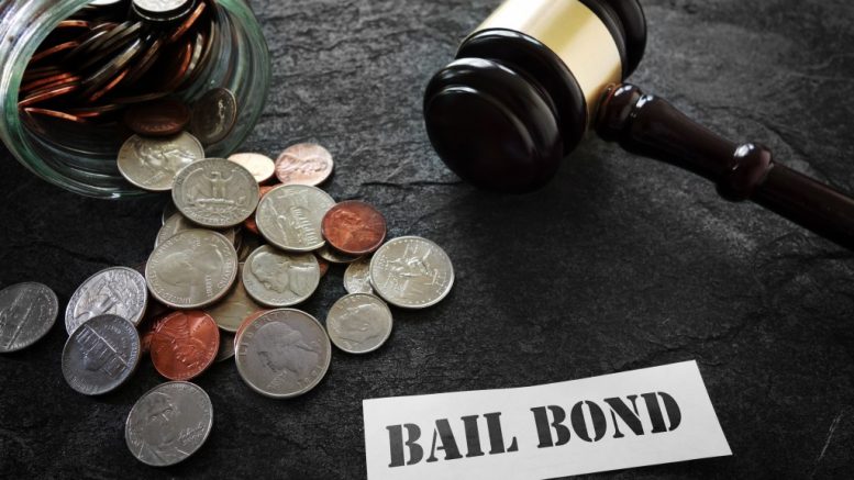 bail bond with gavel and money