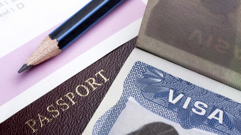 Passport and visa and pencil